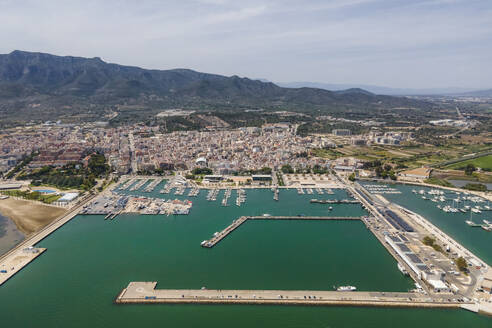 Aerial view of La Rapita, a small town with harbour along the Mediterranean Sea coastline, Tarragona, Spain. - AAEF20407