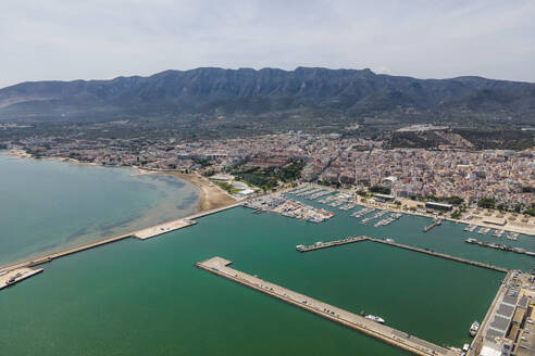 Aerial view of La Rapita, a small town with harbour along the Mediterranean Sea coastline, Tarragona, Spain. - AAEF20410