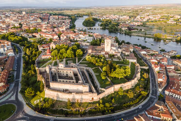 Aerial view of Zamora old town with fortified walls, view of the main cathedral and the castle at sunset, Spain. - AAEF20509
