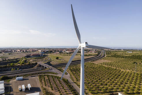 Aerial view of many wind turbines in a wind farm in countryside, La Muela, Zaragoza, Spain. - AAEF20524