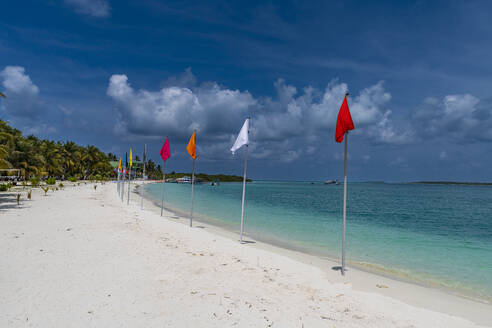 White sand beach with many flags, Bangaram island, Lakshadweep archipelago, Union territory of India, Indian Ocean, Asia - RHPLF26136