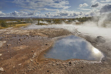A steaming volcanic pool at Geysir, in the Golden Circle, in southwest Iceland, Polar Regions - RHPLF26198