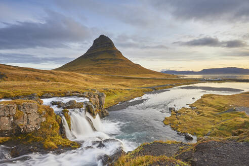 Mount Kirkjufell and Kirkjufellsfoss Falls, near the port of Grundarfjordur, Snaefellsnes peninsula, western Iceland, Polar Regions - RHPLF26208