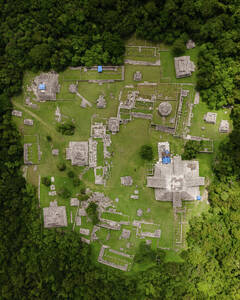 Aerial view of an ancient Maya archeological site with ruins in Tecoh, Yucatan, Mexico. - AAEF20590