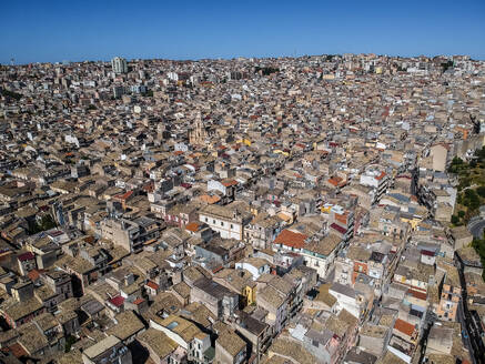 Aerial view of Ragusa new town with a large residential district, Sicily, Italy. - AAEF20628