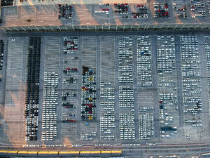 Aerial view of new vehicles parked at Koper commercial port in Slovenia. - AAEF20646