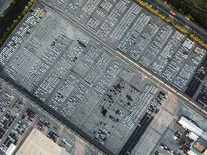 Aerial view of new vehicles parked at Koper commercial port in Slovenia. - AAEF20647