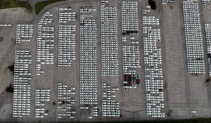 Aerial view of new vehicles parked at Koper commercial port in Slovenia. - AAEF20648