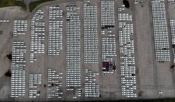 Aerial view of new vehicles parked at Koper commercial port in Slovenia. - AAEF20648