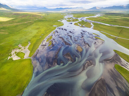 Aerial view of glacial river Heradsvotn with sandbanks between grasslands, northern Iceland. - AAEF20769