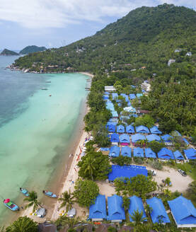 Aerial view of resort roofs on Sairee beach on Ko Tao island, Thailand. - AAEF20827