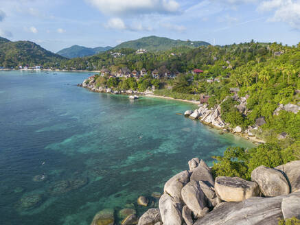 Aerial view of Chalok Baan Kao bay granite coast line on the island of Ko Tao, Thailand. - AAEF20840