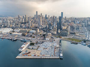 Aerial view of Port of Beirut with Beirut skyline in background at sunset, Lebanon - AAEF20876