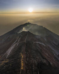 Aerial view of Mount Agung at sunset, a volcano on Bali Island, Indonesia. - AAEF20957