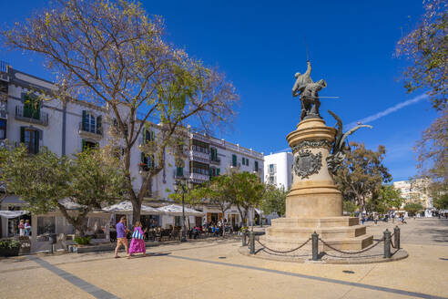 View of statue, restaurants and cafes in Vara de Rei Square, UNESCO World Heritage Site, Ibiza Town, Eivissa, Balearic Islands, Spain, Mediterranean, Europe - RHPLF26322