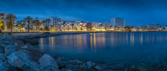 View of Platja de ses Figueretes Beach at dusk, Ibiza Town, Ibiza, Balearic Islands, Spain, Mediterranean, Europe - RHPLF26337