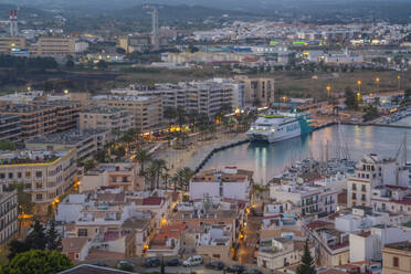 Elevated view of harbour, Dalt Vila district and city defence walls at dusk, UNESCO World Heritage Site, Ibiza Town, Eivissa, Balearic Islands, Spain, Mediterranean, Europe - RHPLF26342