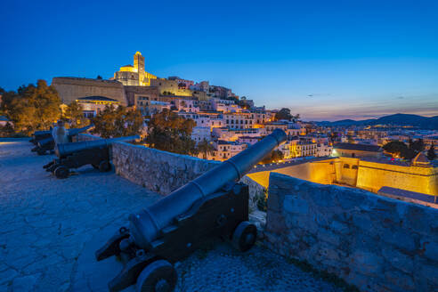 View of Bastion, cannons, ramparts, Cathedral and Dalt Vila old town at dusk, UNESCO World Heritage Site, Ibiza Town, Balearic Islands, Spain, Mediterranean, Europe - RHPLF26346