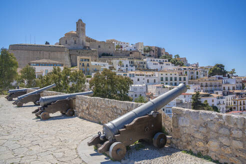 View of cannons, Dalt Vila and Cathedral, UNESCO World Heritage Site, Ibiza Town, Eivissa, Balearic Islands, Spain, Mediterranean, Europe - RHPLF26355
