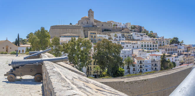 View of cannons, Dalt Vila and Cathedral, UNESCO World Heritage Site, Ibiza Town, Eivissa, Balearic Islands, Spain, Mediterranean, Europe - RHPLF26357