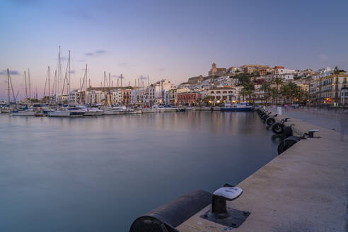 View of Cathedral and Dalt Vila overlooking harbour at dusk, Ibiza Town, Eivissa, Balearic Islands, Spain, Mediterranean, Europe - RHPLF26362