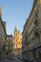 Illuminated St. Nicholas Church at sunrise, Mala Strana, UNESCO World Heritage Site, Prague, Bohemia, Czech Republic (Czechia), Europe - RHPLF26449