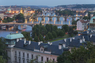 Bridges over Vltava River against sky seen from Letna Park at twilight, Prague, Bohemia, Czech Republic (Czechia), Europe - RHPLF26473