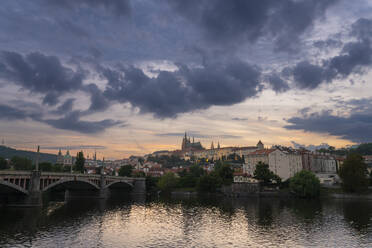 Prague Castle and Manes Bridge at dusk, Prague, Bohemia, Czech Republic (Czechia), Europe - RHPLF26480
