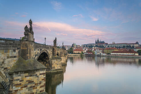 Prague Castle and Charles Bridge on Vltava River at sunrise, UNESCO World Heritage Site, Prague, Bohemia, Czech Republic (Czechia), Europe - RHPLF26495