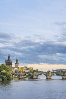 Charles Bridge and Old Town Bridge Tower against sky, UNESCO World Heritage Site, Prague, Bohemia, Czech Republic (Czechia), Europe - RHPLF26501