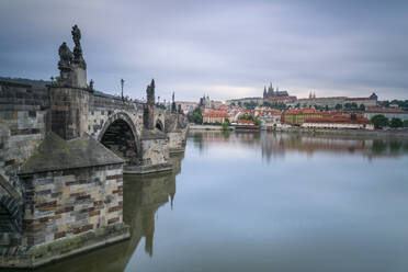 Prague Castle and Charles Bridge on Vltava River in city, UNESCO World Heritage Site, Prague, Bohemia, Czech Republic (Czechia), Europe - RHPLF26508