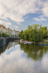 Art nouveau buildings along Vltava River and boats at Slovansky island, Prague, Czech Republic (Czechia), Europe - RHPLF26510