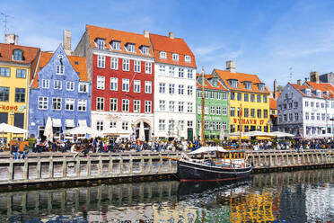 Nyhavn harbour with colourful houses reflected in the waters channel, daytime, Copenhagen, Denmark, Scandinavia, Europe - RHPLF26521