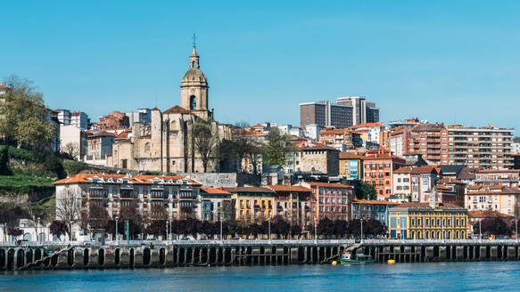 Andra Maria Basilika next to the River Nervion promenade in Portugalete, Bilbao, Basque Country, Spain, Europe - RHPLF26705