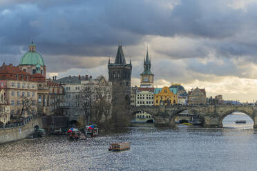 Charles Bridge and Church of Saint Francis of Assisi with Old Town Bridge Tower, UNESCO World Heritage Site, Prague, Bohemia, Czech Republic (Czechia), Europe - RHPLF26714