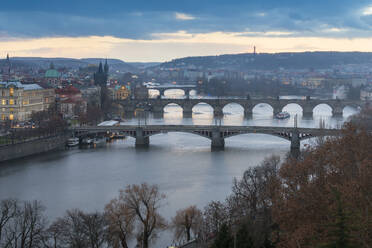 Bridges over Vltava River against sky seen from Letna park at twilight, Prague, Bohemia, Czech Republic (Czechia), Europe - RHPLF26724