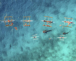 Aerial view of people with a catamarans watching the Whale sharks along the coast in Dubai, United Arab Emirates. - AAEF21005