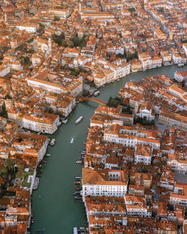 Aerial view of boats sailing along the Grand Canal in Venice downtown, Veneto, Italy. - AAEF21024