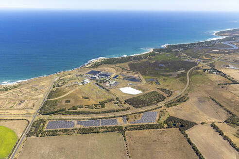 Aerial view of an industrial area along the coastline in Connewarre, Victoria, Australia. - AAEF21052