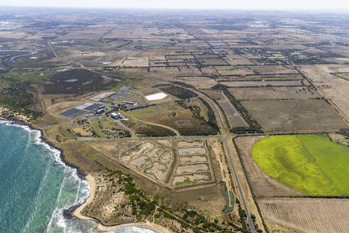 Aerial view of an industrial area along the coastline in Connewarre, Victoria, Australia. - AAEF21053