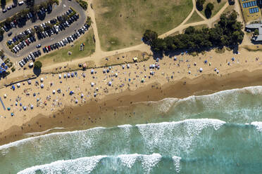 Aerial view of people on the beach at Lorne Queens-cliff Coastal reserve, Lorne, Victoria, Australia. - AAEF21060