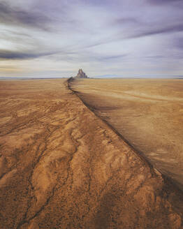 Aerial view of the famous monadnock Shiprock at sunset, Navajo Nation, San Juan County, New Mexico, United States. - AAEF21163