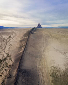 Aerial view of the famous monadnock Shiprock at sunset, Navajo Nation, San Juan County, New Mexico, United States. - AAEF21166