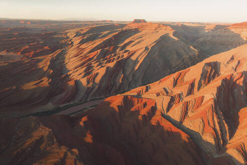 Aerial view of triangular shaped rocks along San Juan River, near Mexican Hat, Utah, United States. - AAEF21184