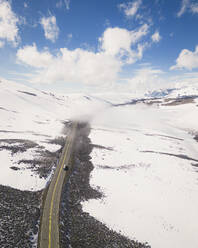 Aerial view of the snowy road leading to Conway Summit, California, United States. - AAEF21322