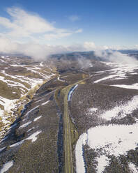 Aerial view of the snowy road leading to Conway Summit, California, United States. - AAEF21323