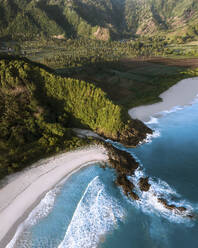 Aerial view of a promontory along the coastline, Selong Belanak Beach, Lombok, Indonesia. - AAEF21535