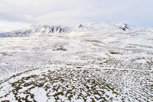 Aerial view of Snaefellsjokull mountain in winter covered with snow, Snaefellsnes, Iceland. - AAEF21778