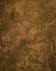 Aerial view of agricultural fields in an arid valley, Vakinankaratra state, Madagascar. - AAEF21818
