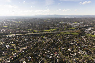 Aerial view of Springvale road highway intersection on a perfect summers day, Melbourne, Australia. - AAEF21839